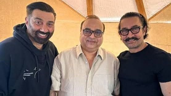 <div class="paragraphs"><p>Director Rajkumar Santoshi flanked by actor Sunny Deol and producer Aamir Khan.&nbsp;</p></div>